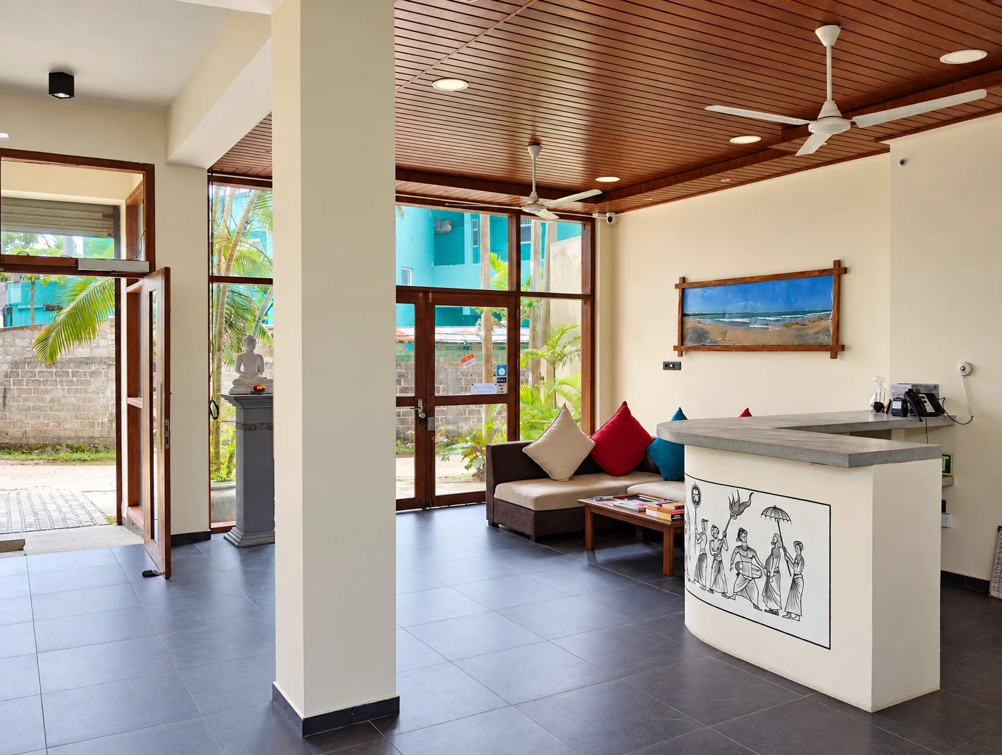 Chaaya Inn entrance with Buddha and reception