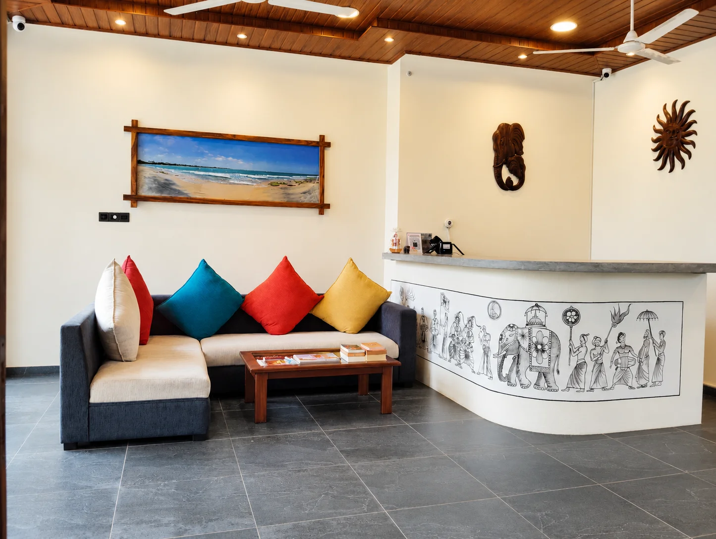 Chaaya Inn reception with colorful cushions