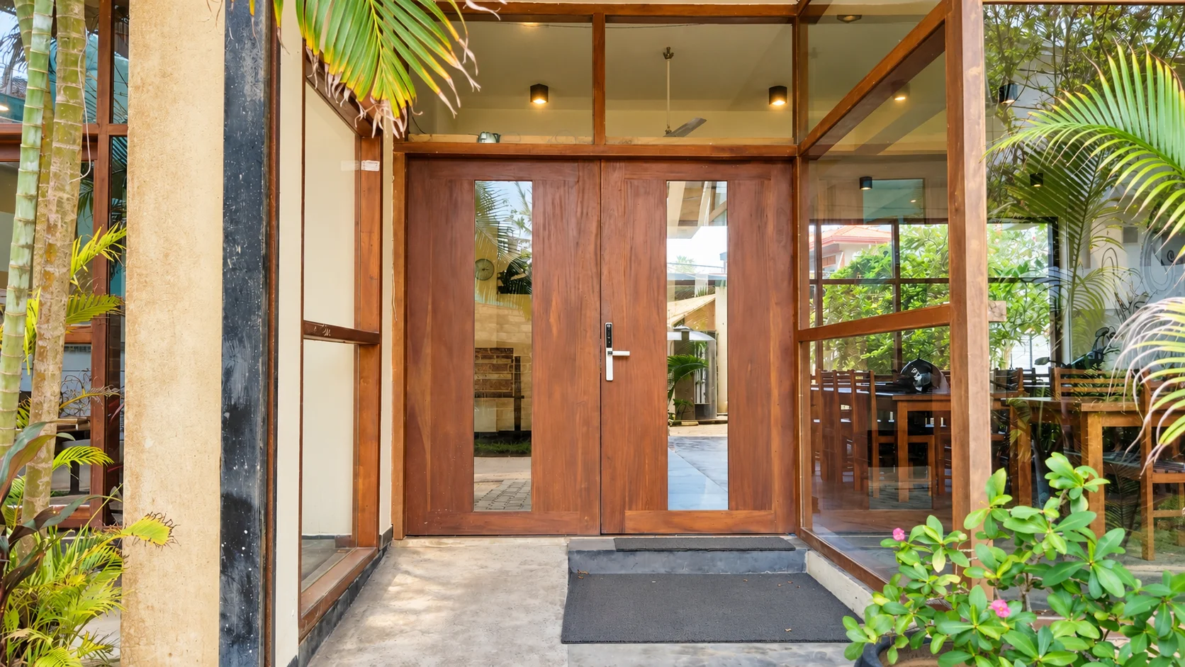 Chaaya Inn’s Warm Wooden Entrance