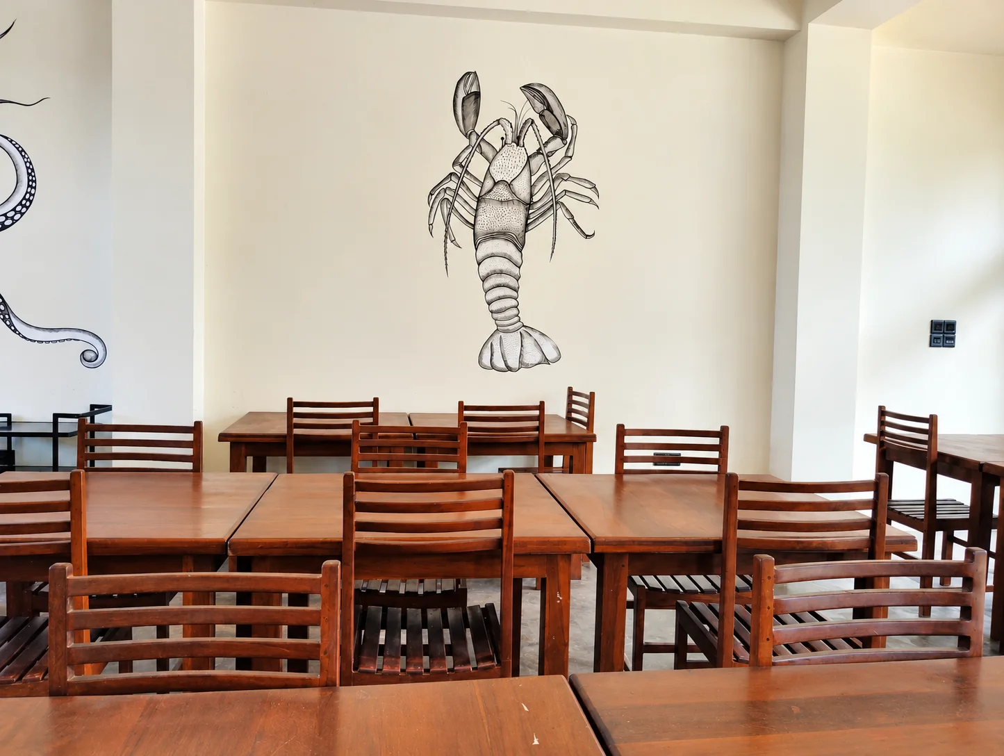 Hotel dining room with lobster mural