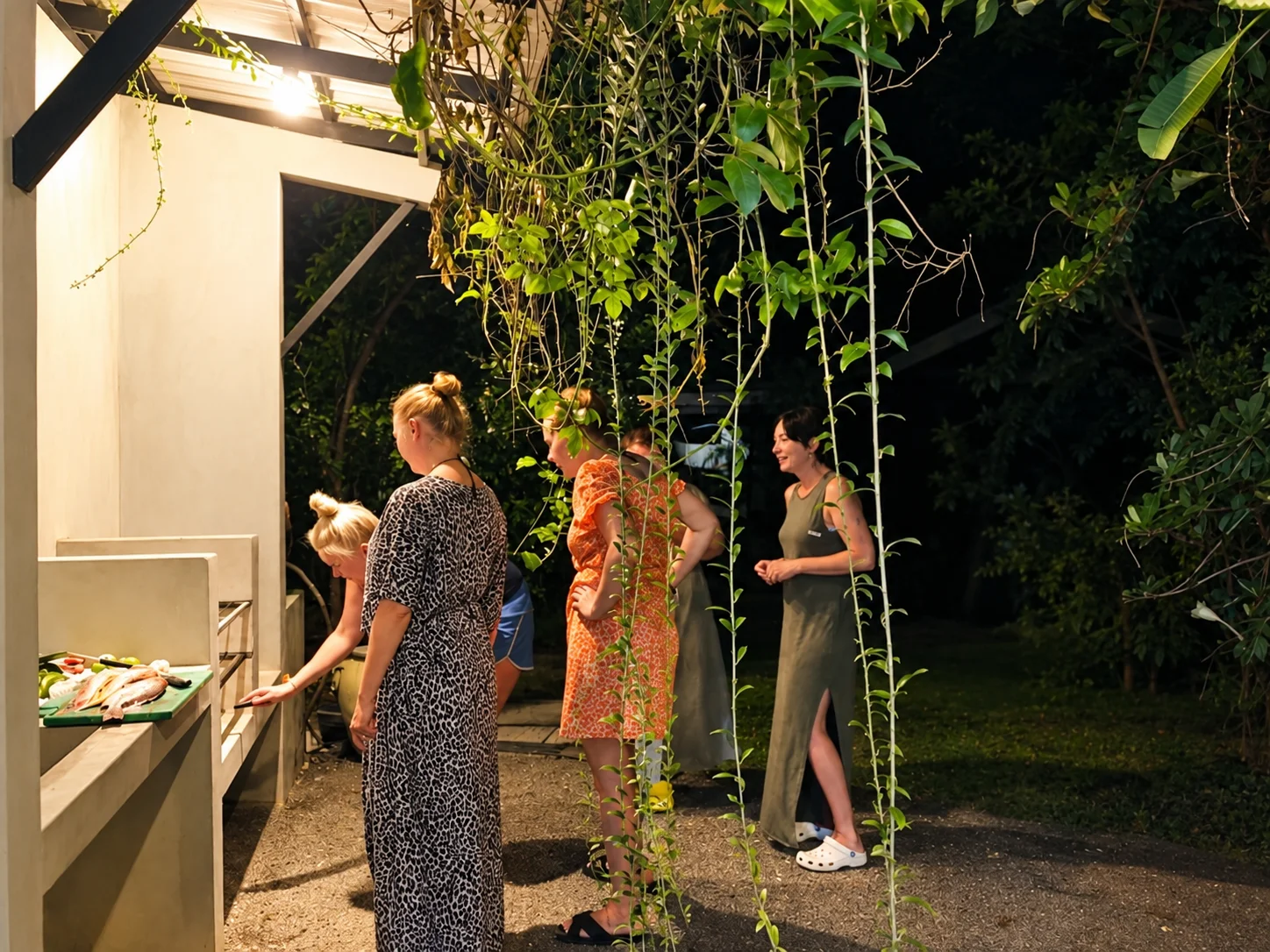 Night Barbecue Under Hanging Vines